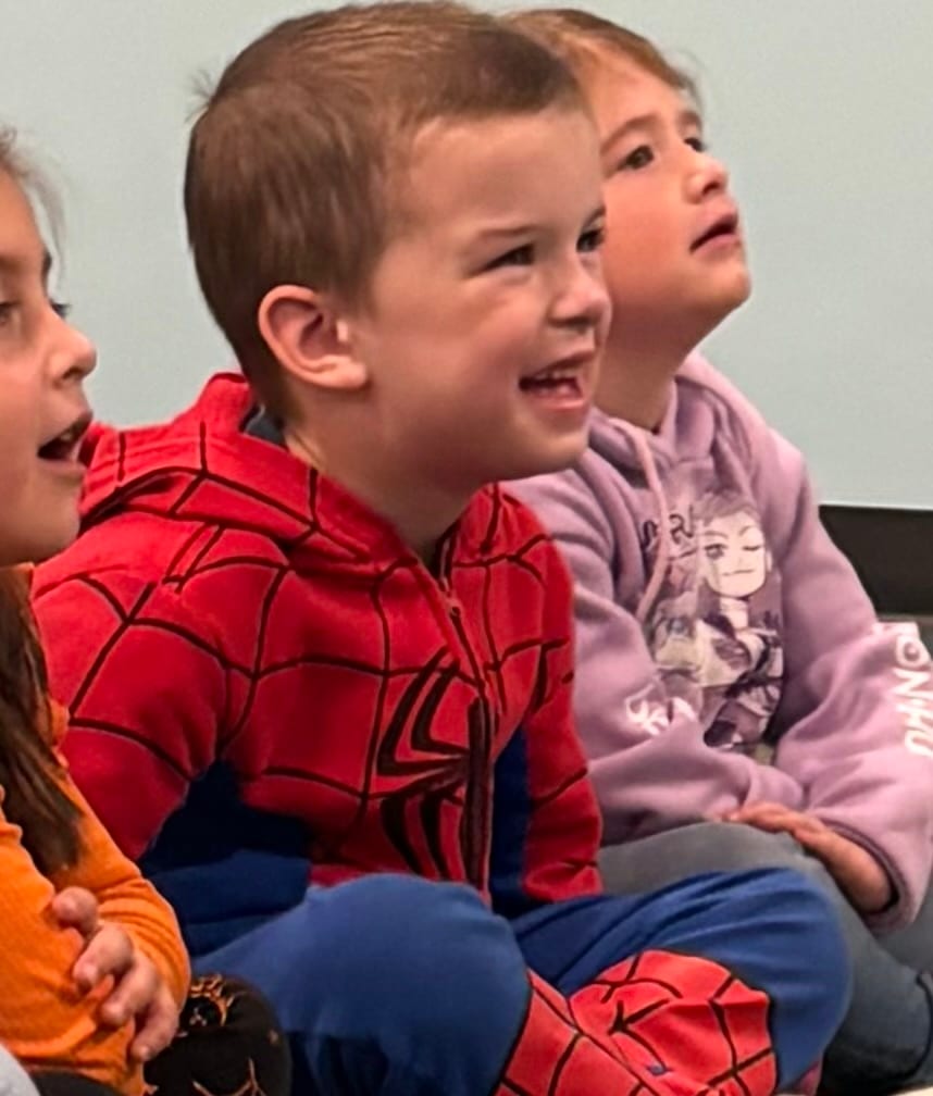 Children laughing during the Pumpernickel Puppet Man show at Mountainside Children's Center