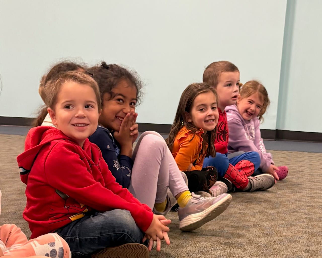 Preschoolers watching the puppet show at Mountainside Children's Center